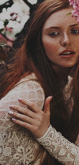 Portrait of a woman with freckles