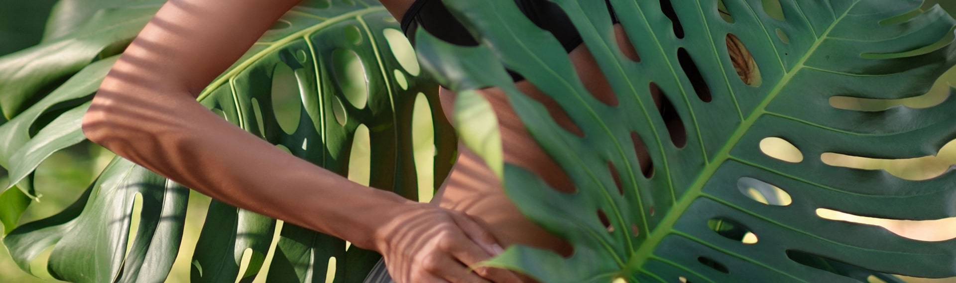 Editorial portrait among green leaves