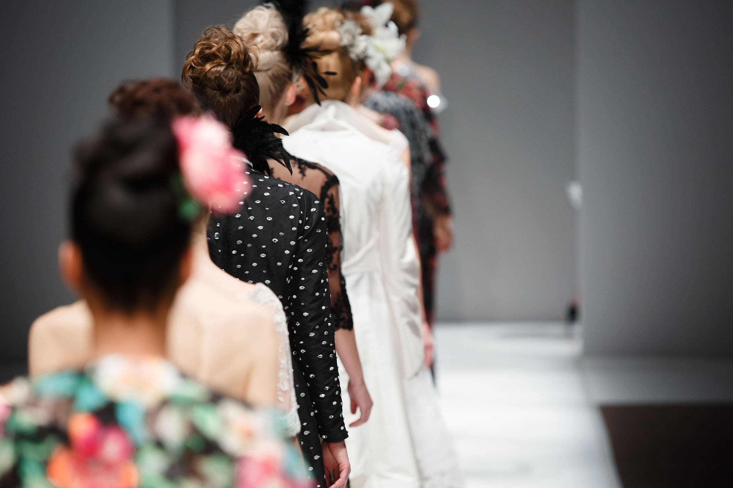 Models walking in a fashion runway show